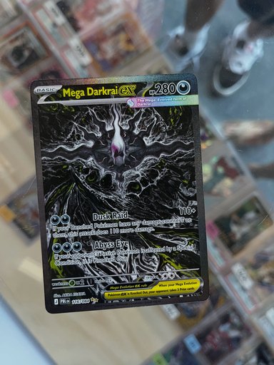 Mega Darkrai ex 116/084 Pitch Black chase card pulled at the Zen Bros shop