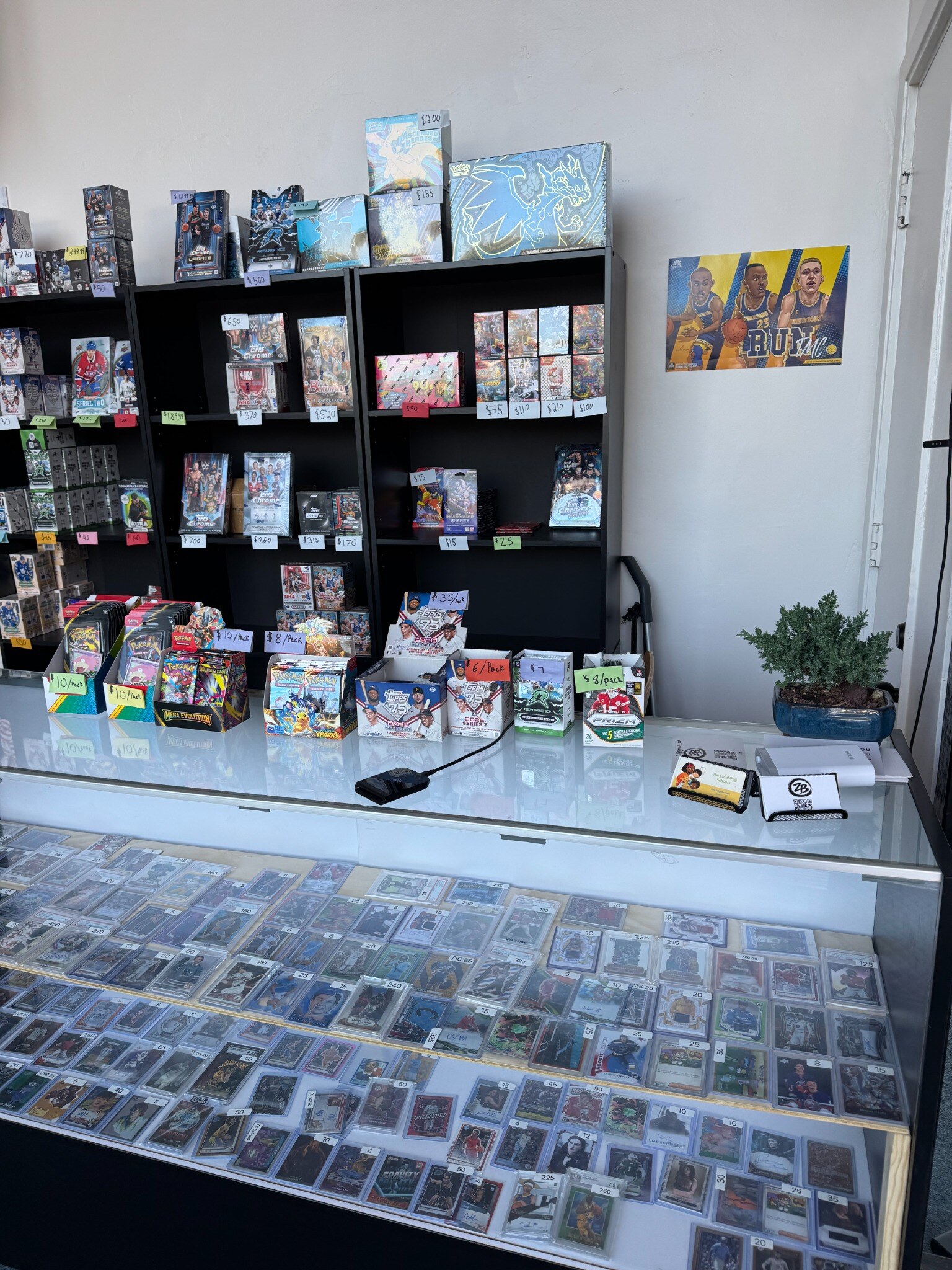 The counter and card display case at Zen Bros Breaks